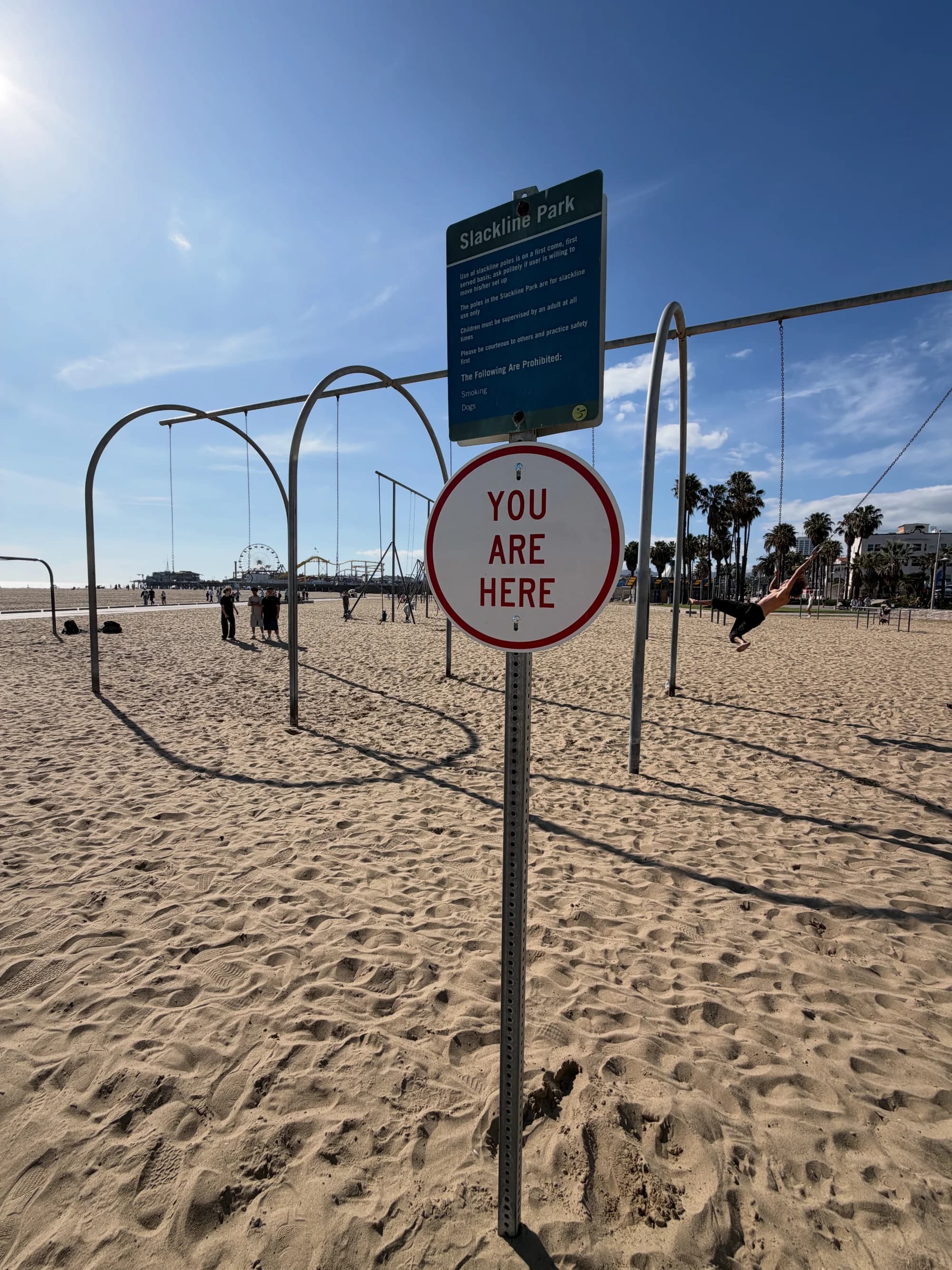 You are here. Sign installation Muscle Beach, Santa Monica, CA.