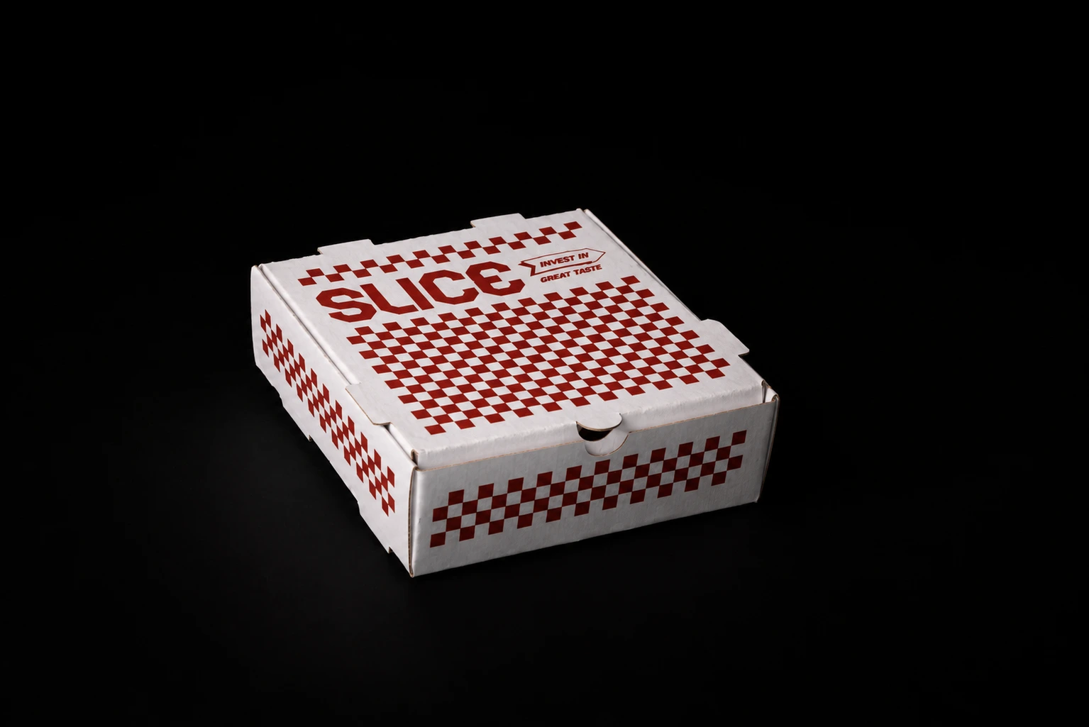 A close view of the folded Slice mini pizza box, with the lid tabs, front closure, and red checkerboard print visible.